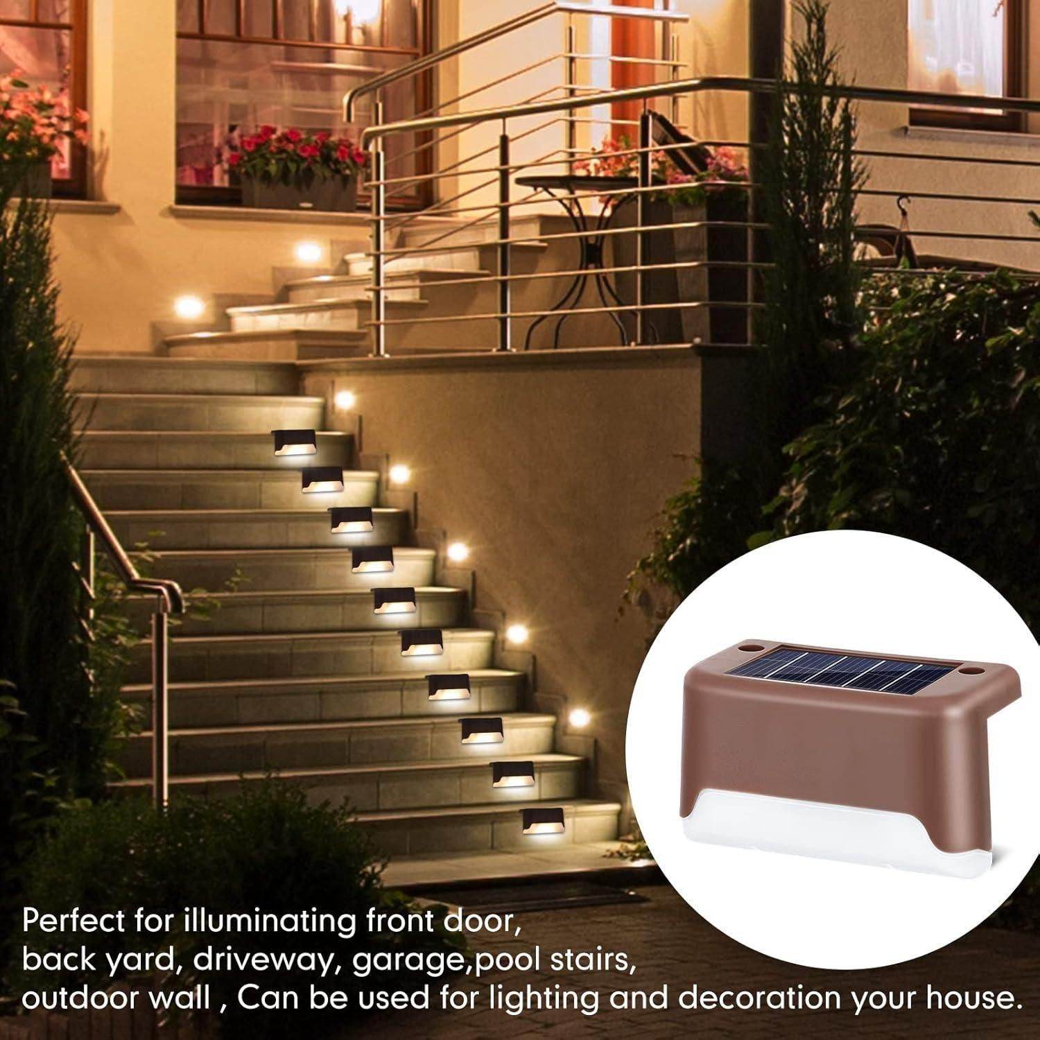 Outdoor solar stair lights illuminating a home staircase at night with a close-up of the brown solar light unit