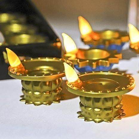 Decorative LED water pouring diya light set with gold-colored base and warm glowing flame tips