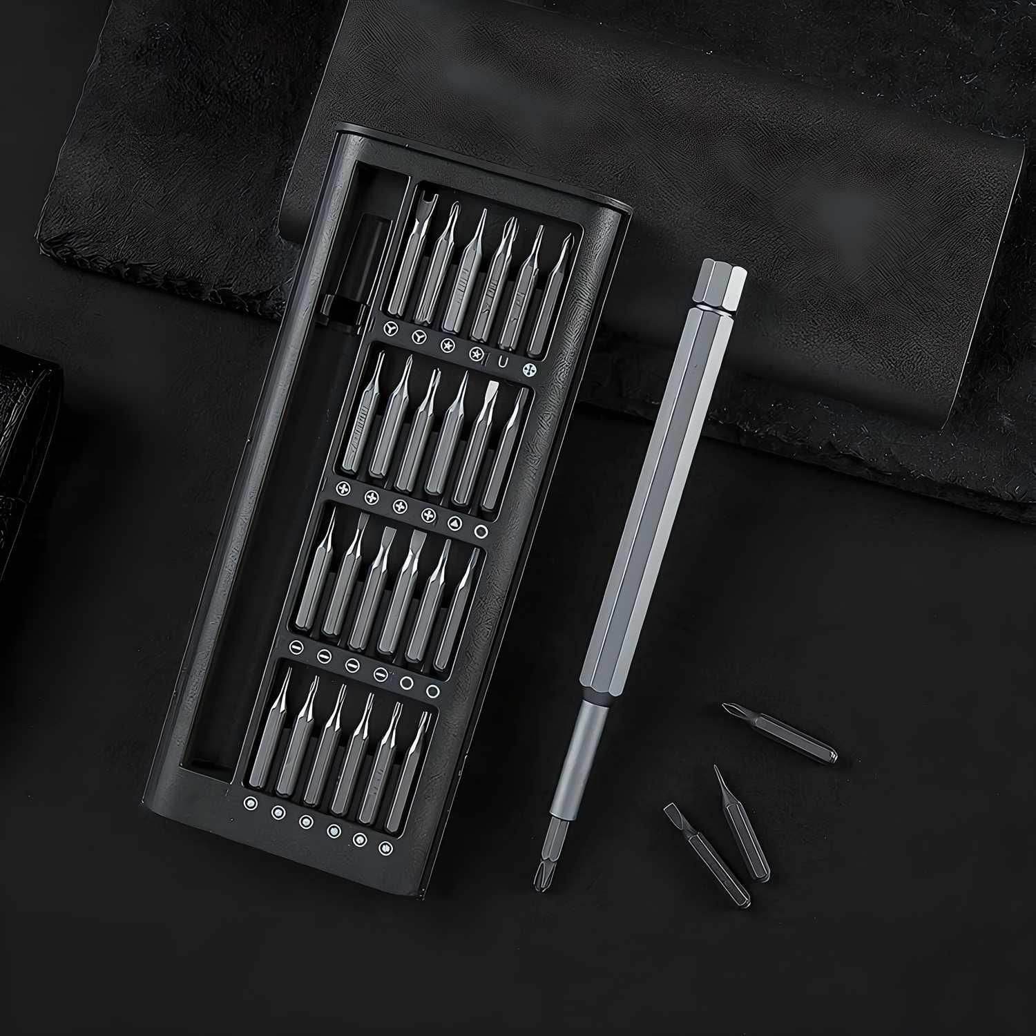 Precision screwdriver set online with multiple metal bits and a silver handle in a black case